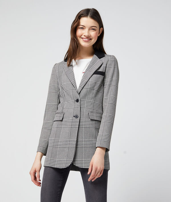 Veste de tailleur à carreaux noir.