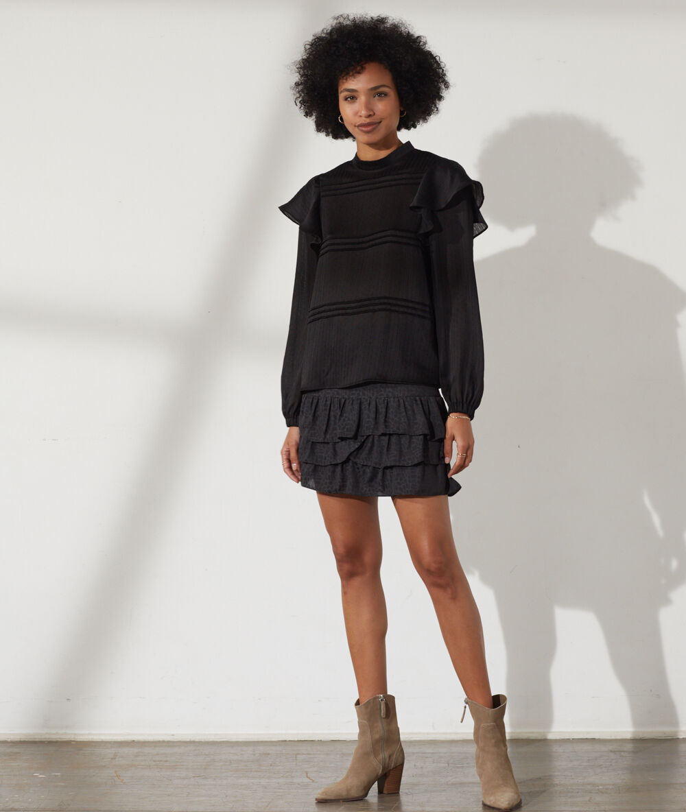 Blouse avec volants sur les manches noir.