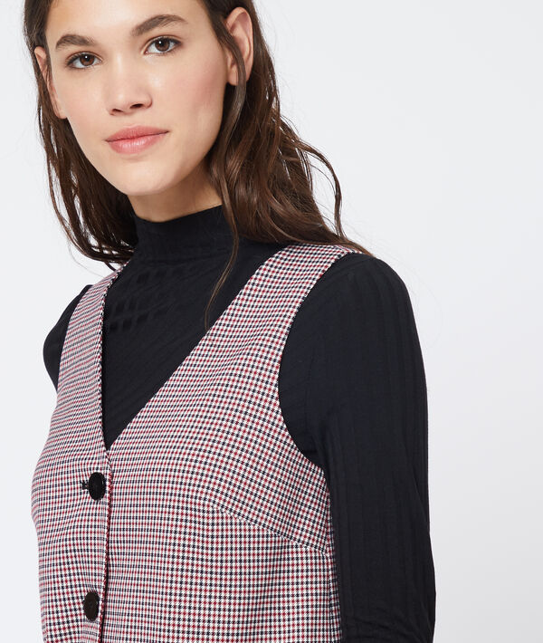 Robe salopette à motifs pied de poule marine.