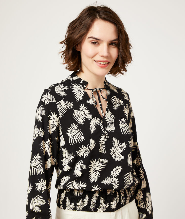 Blouse smockée imprimé feuillage noir.