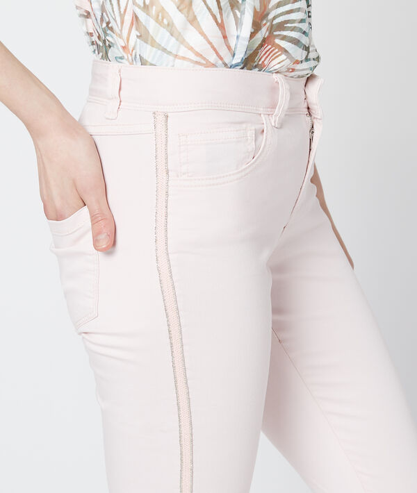 Pantalon slim à bords métallisés nude.