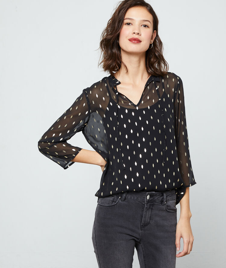 Blouse doublée à motifs plumes noir.