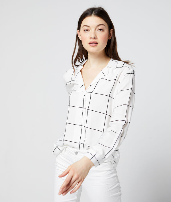 Chemise à carreaux ecru.