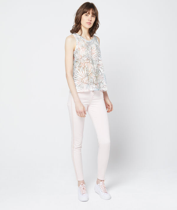 Pantalon slim à bords métallisés nude.