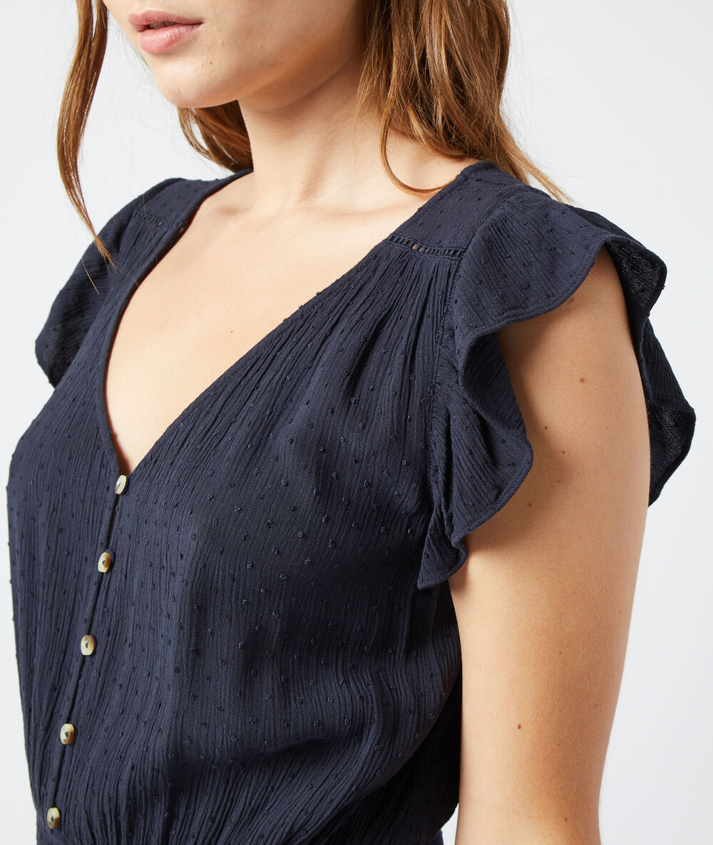 Robe longue en plumetis noir.