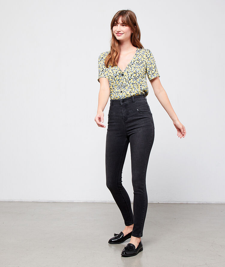 Jean slim taille haute noir.