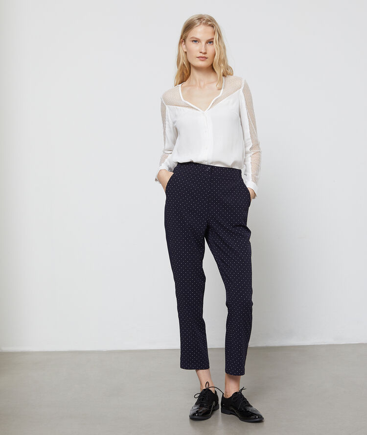 Pantalon cigarette à pois marine.