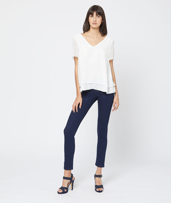 Jean slim bleu.