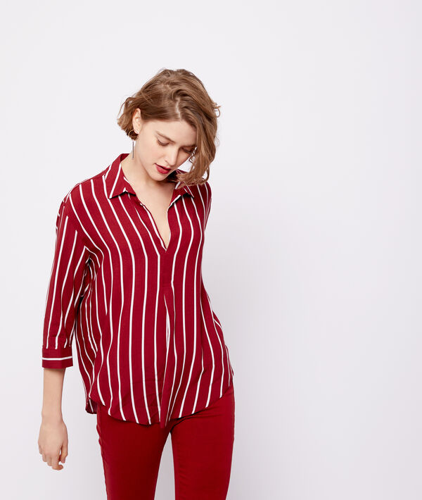 Chemise à rayures sienne.