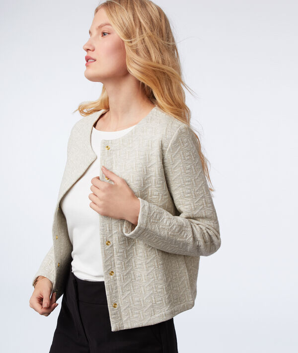 Veste à fils métallisés sable.