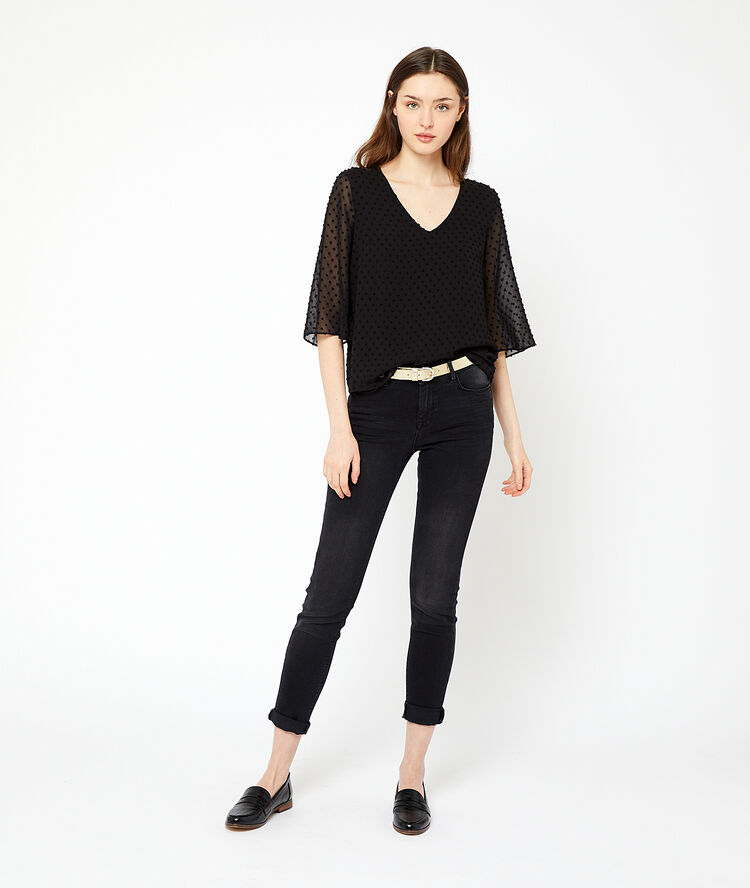 Jean slim avec ceinture noir.