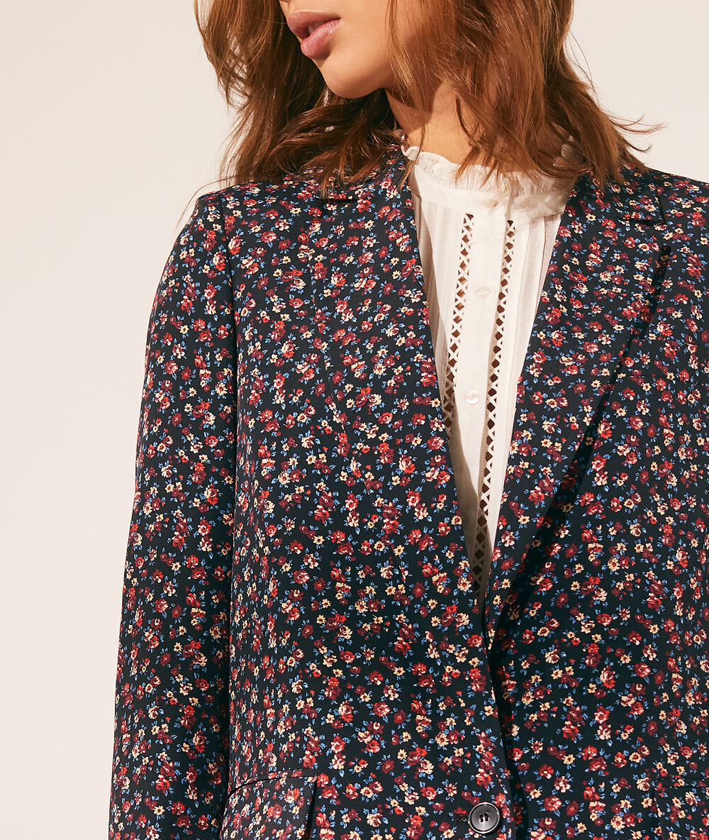 Veste de tailleur imprimé fleuri noir.