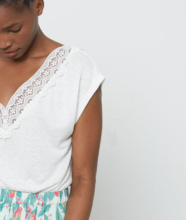 T-shirt décolleté en v à broderie fleurie blanc.