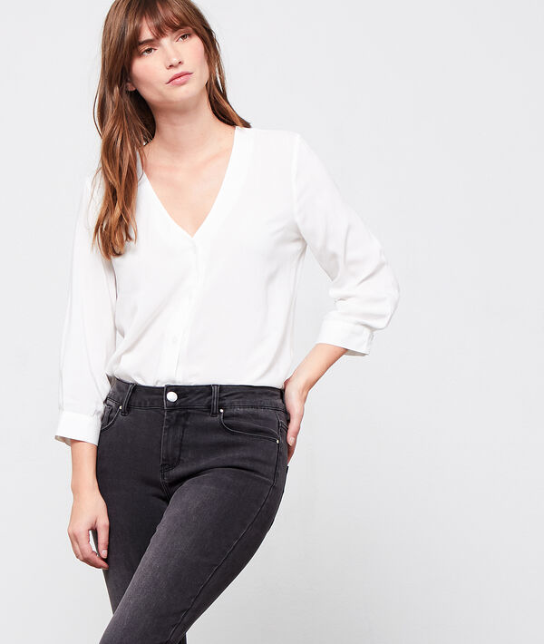 Blouse col v boutonnée blanc.