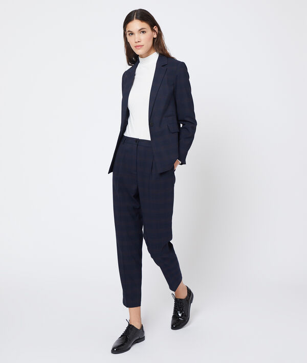Veste de tailleur à carreaux marine.