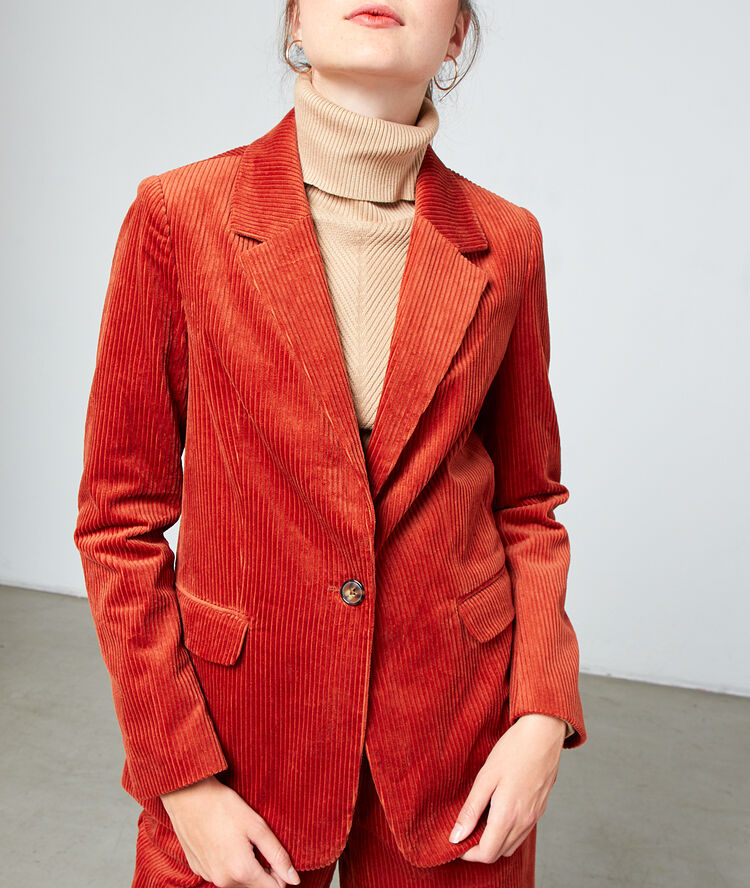 Veste de tailleur en velours côtelé rouille.