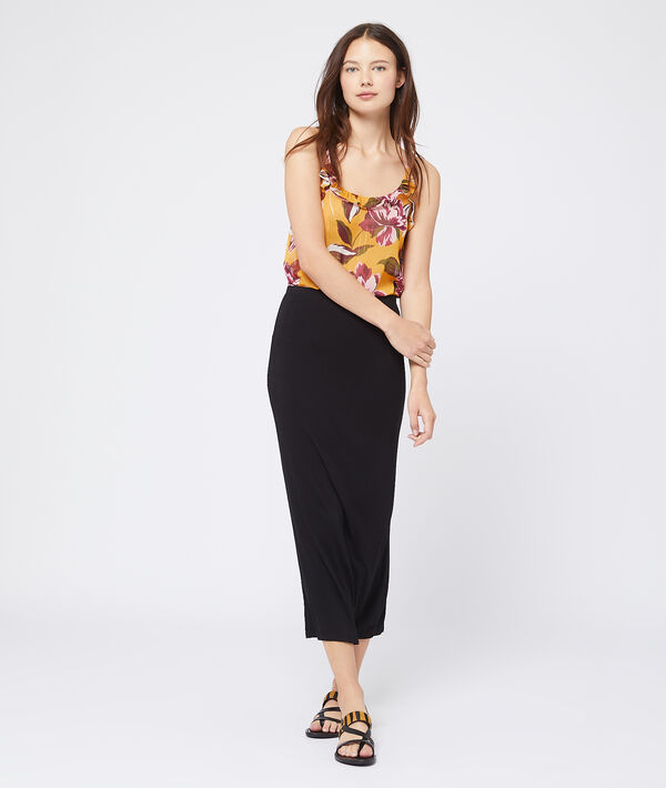 Jupe crayon midi noir.