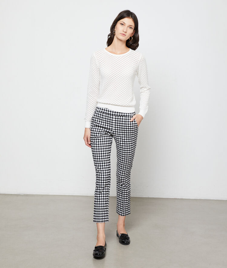 Pull en maille ajourée off-white.