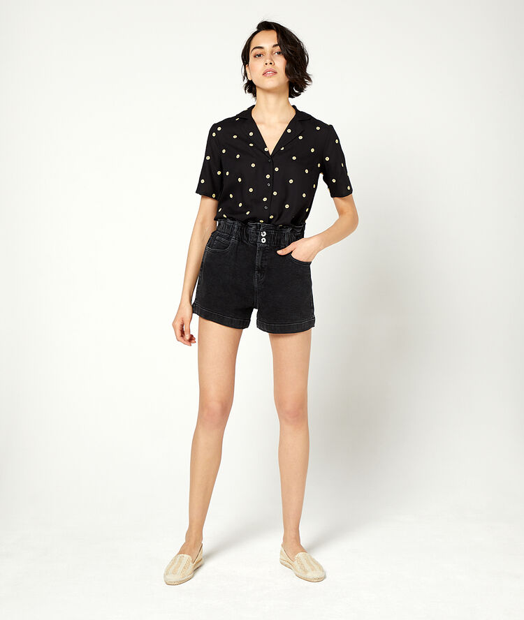 Blouse à imprimé fleuri noir.