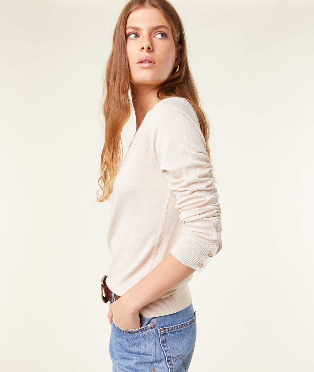Pull col v beige chine.