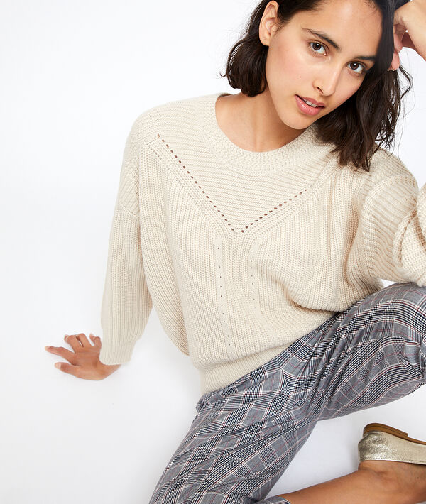 Pull en grosse maille grege.