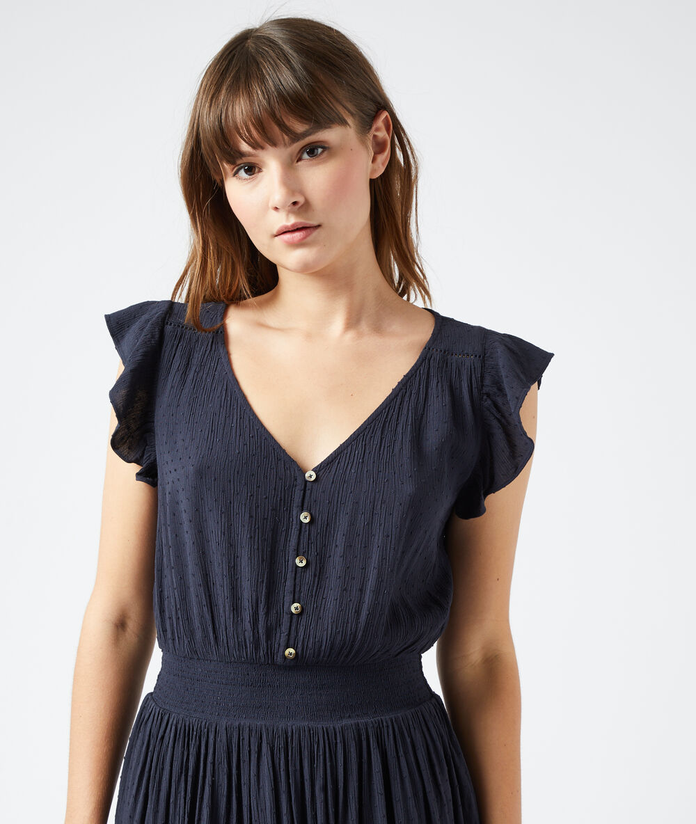 Robe longue en plumetis noir.