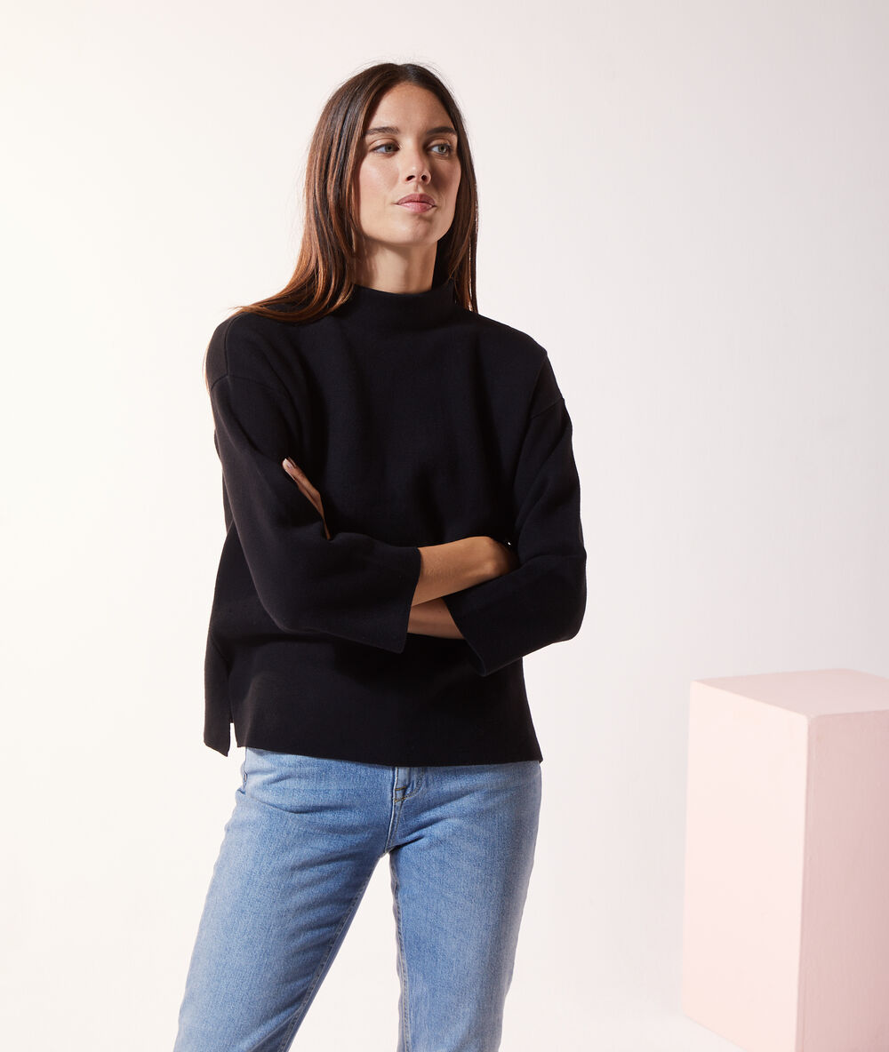 Pull col montant noir.