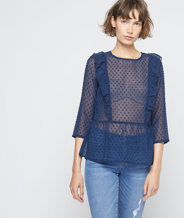 Blouse transparente en plumetis bleu d'encre.