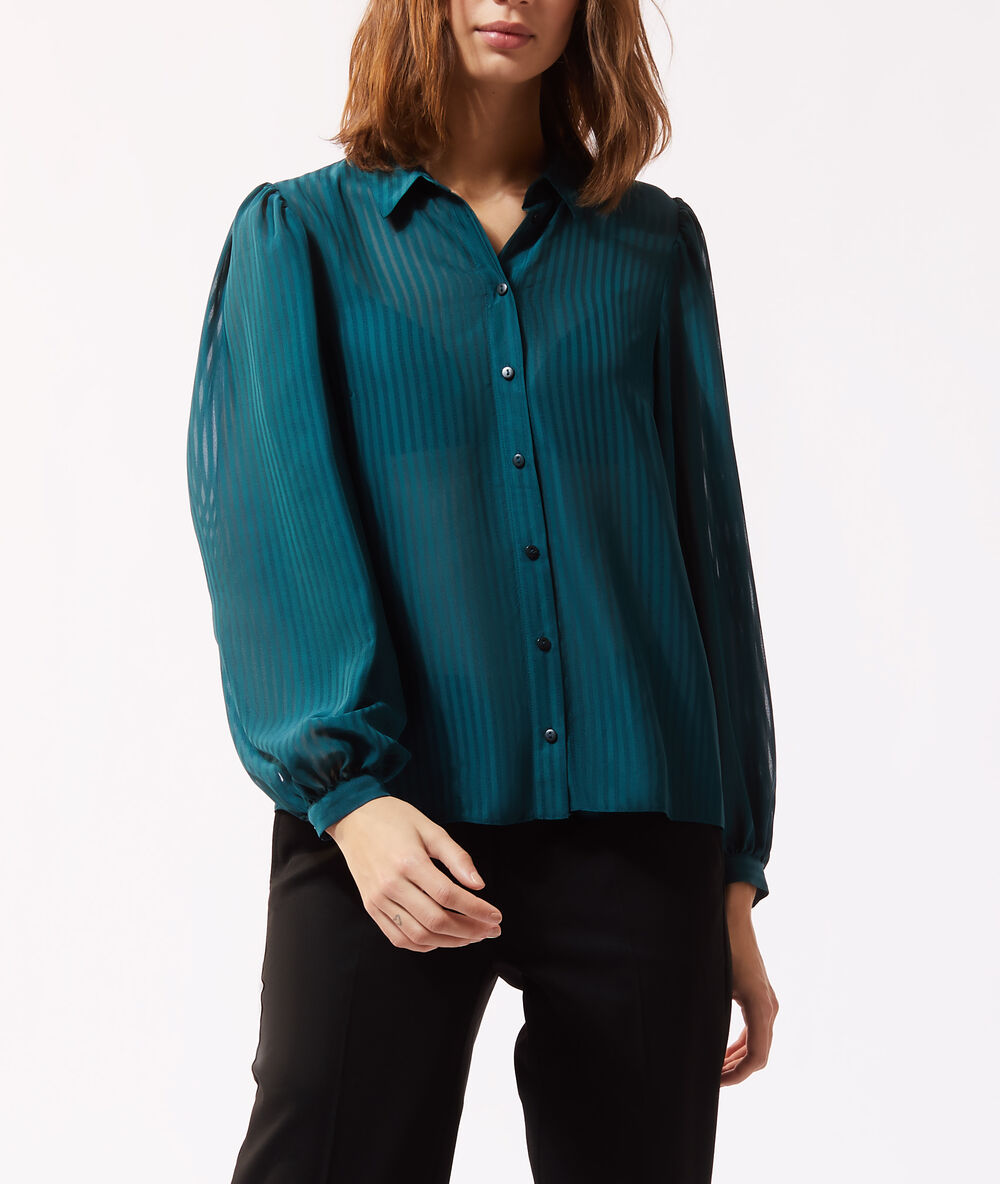 Chemise transparente manches ballon sapin.