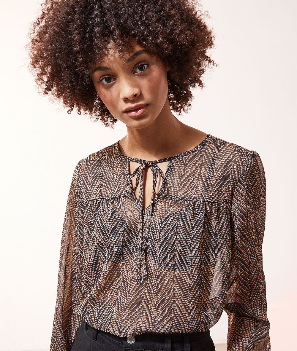 Blouse imprimé géométrique noir.