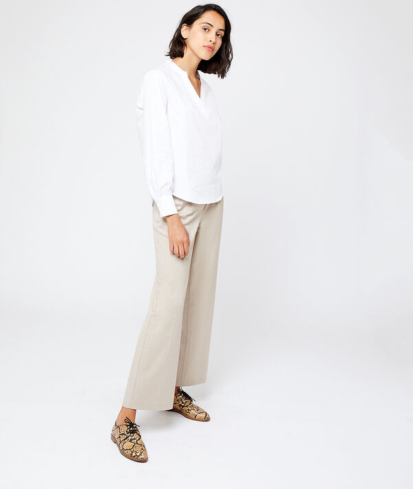 Chemisier en coton blanc.