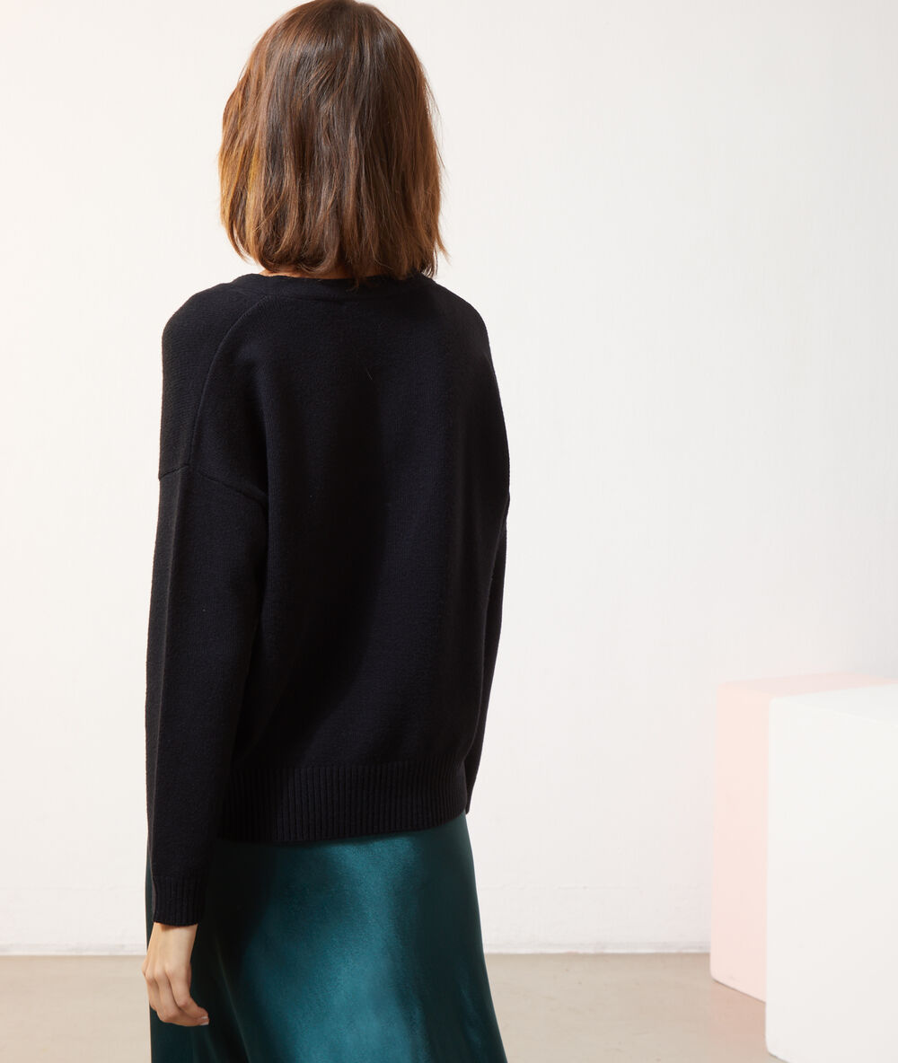 Pull col v détails dentelle noir.