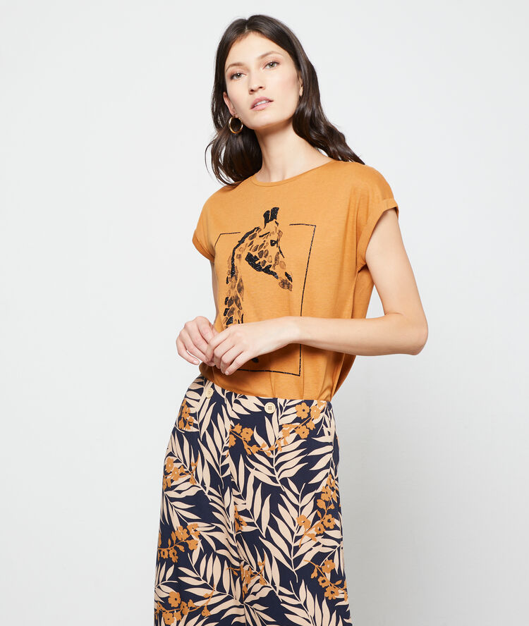 Pantalon large à imprimé feuillage marine.