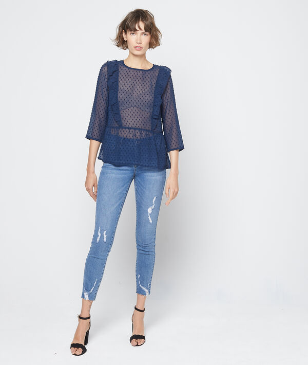 Blouse transparente en plumetis bleu d'encre.