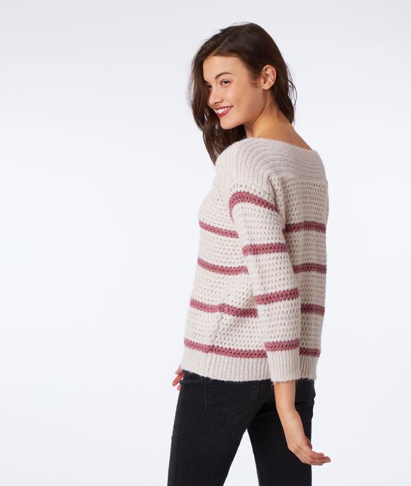 Pull grosse maille à fils métallisés nude.