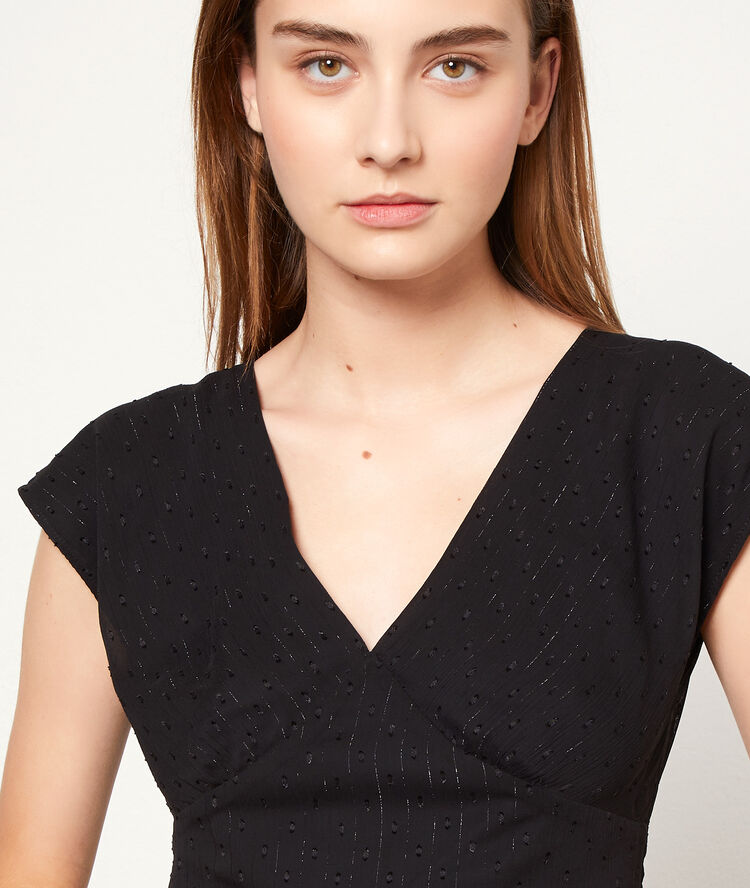 Robe longue en plumetis noir.