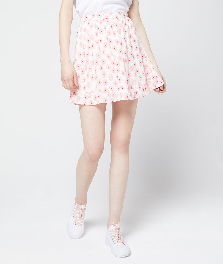 Jupe patineuse à imprimé fleuri rose pale.