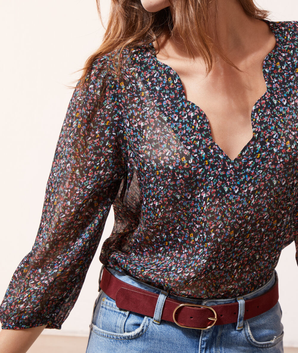 Blouse imprimé fleuri noir.