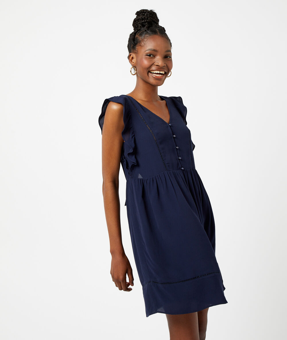 Robe dos noué à volants marine.