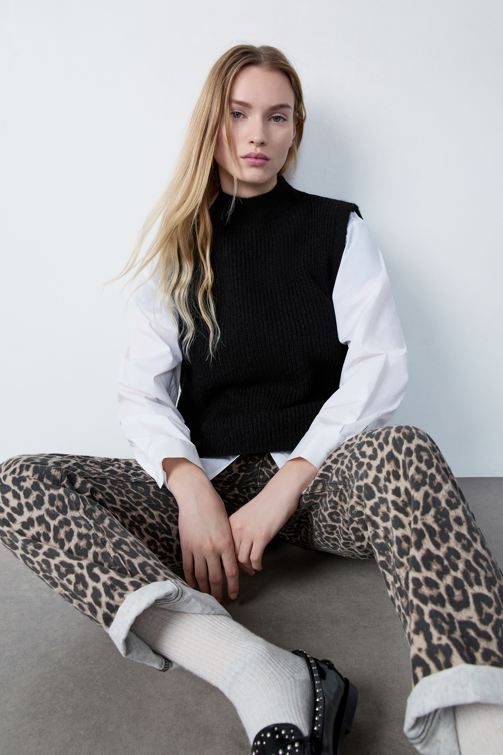 Pull col montant sans manches à nouer